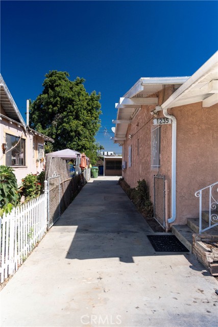 Long Drive Way on the Left Side of Home