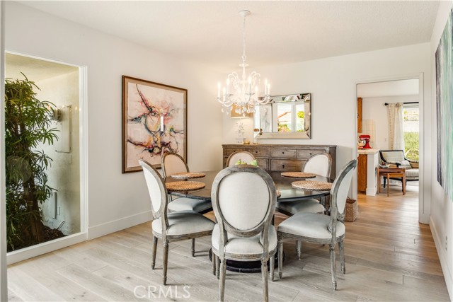 Formal dining room leads into kitchen