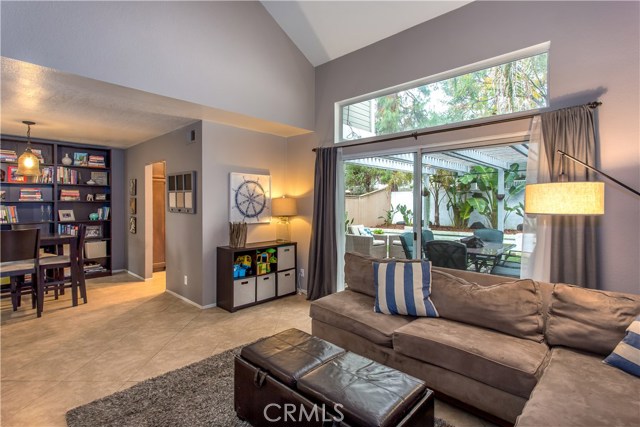 Formal living room provides elegant options for entertaining.   Great view of the backyard.