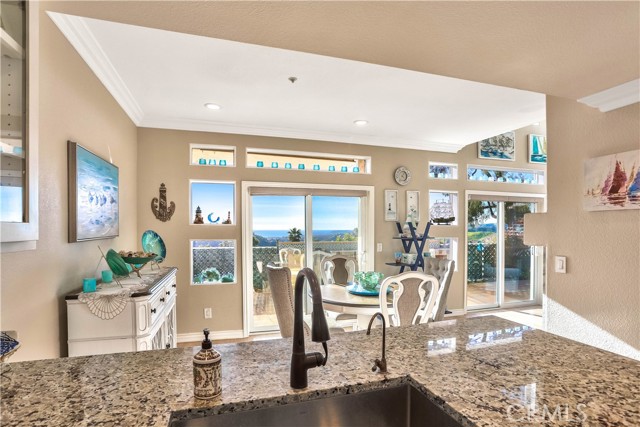 Who wouldn't want to do the dishes when you can see the ocean, harbor and Catalina Island from this stunning kitchen.