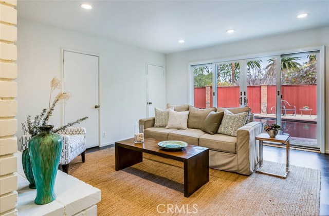 Downstairs family room & fireplace.  Opens to pool & spa.