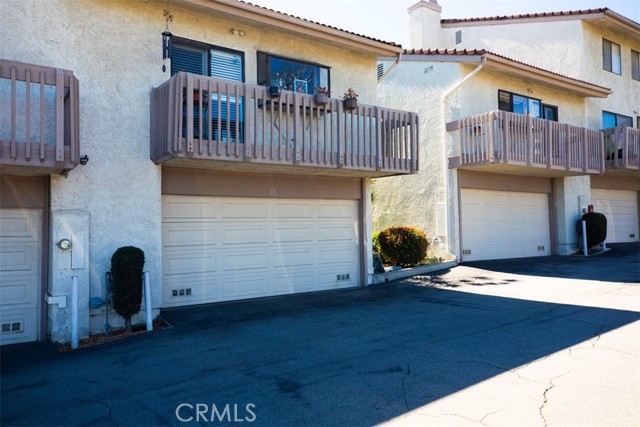 Back of unit with attached garage