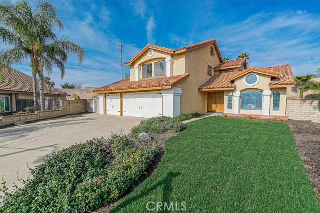 1887 Vail Avenue Upland, California Gorgeous Remodeled Home in Upland! This Home Features Four Bedrooms, 2.5 Bathrooms and 2024 Square Feet of Living Space. The Entire Home Has Been Updated Throughout Including the Kitchen and All Bathrooms. Impressive Kitchen with Quartz Counters, New Cabinets and Farmhouse style sink. Spacious Living Room and Dining Room with Wood Laminate Flooring and Several Windows Providing a Abundance of Natural Light. Separate Family Room with a Stone Fireplace and Custom Mantle, Extra Storage Cupboards and Shelving with Overhead Lighting. Indoor Laundry Room Downstairs with Built in Cabinets. Four Bedrooms are All Upstairs and All Feature Ceiling Fans and Wood Laminate Flooring. Master Bedroom with a Updated Walk In Closet with Organizer. Master Bathroom with Dual Sinks, Custom Vanity and a Separate Tub & Shower with Tile Accents. Three Car Attached Garage with Aluminum Roll Up Doors. The Huge Rear Yard Features a Built in Swimming Pool and Spa that Has Been Replastered and Featuring LED Lighting with Multiple Colors for Night Time Ambiance. Newly Rebuilt Large Covered Patio with a Ceiling Fan, a New Separate Lattice Covered Area for Outside Entertaining, Firepit and Sitting Area and New Sod in Front. This Home has been Freshly Painted Inside and Out, Brand New Tile Roof, Updated Flooring, Some New Windows and Sliders Including a Custom Slider with Built in Privacy Blinds, Ceiling Lighting, Quartz Counters in All Bathrooms & Cabinet Tops Throughout and New Light Fixtures!