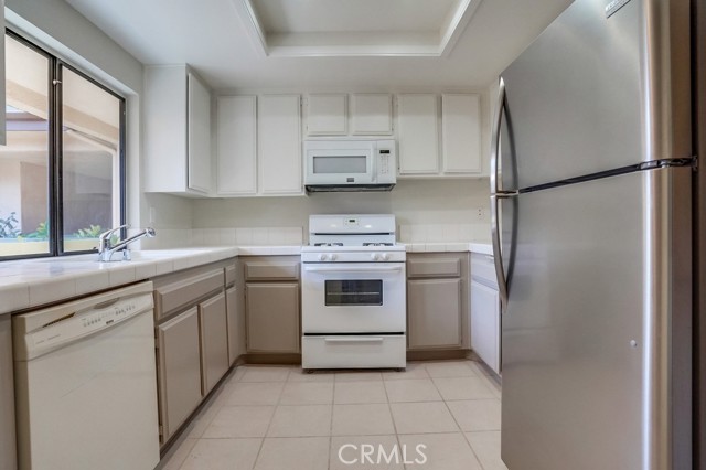 Unit Kitchen, recessed lighting and bright natural light