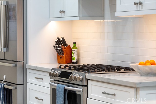 Stainless appliances, plus a secondary oven in pantry area