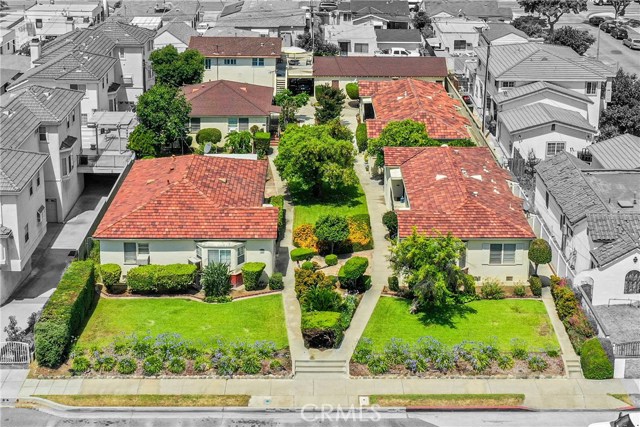 1605 S Atlantic Boulevard Alhambra, California Rare 22,978 sq foot property in the heart of Alhambra. Possibilities are endless. Currently a beautifully maintained 8 unit multi family open garden property. This could be an investor/developers dream come true, so many options here! 5 Buildings spaced throughout the property to create a quiet and peaceful setting with mature fruit trees in the courtyard areas, open spaces, and green landscaping. A mix of units including a studio, 1bed/1bath duplexes, and detached homes including a 3bed/1bath SFR with a basement and fenced yard. All units have laundry hookups inside except studio and upstairs unit has a laundry room downstairs. Parking on site includes 5 single car garages, a two car garage, a carport, and a parking space.
Street parking is located nearby. Buildings range in age, being built between 1946-1954. All tenants are month to month, most have been at the property long term. All units are currently rented and this property rarely has vacancies. Situated in a prime location with close freeway access, public transportation, restaurants, entertainment, retail shops, parks, and more.