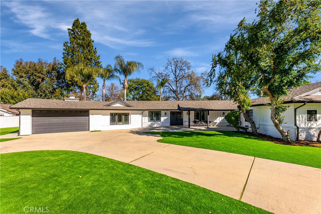 Welcome home to this privately gated single-story ranch-style entertainers mini estate. Impeccably remodeled in the prestigious Walnut Acres area of Woodland Hills! With an open floor plan that creates a sense of spaciousness and flow throughout. This home is well-suited for comfortable living, with 4 bedrooms and 4 bathrooms with that provides ample space for a family or guests, great for accommodating different lifestyles and needs.. This home is a great option for anyone looking for a comfortable and updated home. The resort-style backyard offers plenty of room for outdoor activities and entertaining such as gardening, playing, and relaxing by the swimming pool. The fenced yard with mature landscaping also creates a sense of privacy and separation from neighboring properties, for the ultimate in privacy. Overall, the combination of a spacious lot with drought-tolerant landscaping and a pool can make this home an attractive option for anyone who enjoys spending time outdoors and values a low-maintenance and eco-friendly landscape. The garage has been converted to a recording studio can easily be converted back.