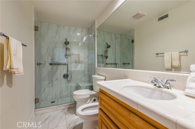 Downstairs Bathroom #1 with remodeled shower. Downstairs Bathroom #1 with remodeled shower.