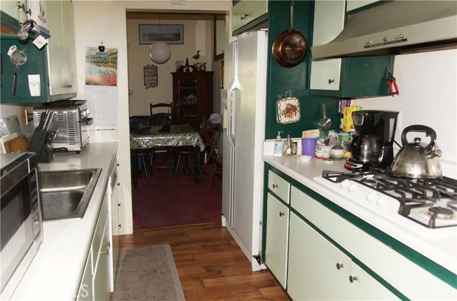 Galley kitchen with plenty of cabinets space