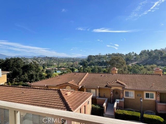Panoramic views and amazing location! Beautiful single level unit offers 2 spacious bedrooms, 2 full bathrooms, Fireplace, Balcony with gorgeous views, single car detached garage, and plenty of open living space.  Home has been freshly painted, updated kitchen cabinet doors, turnkey and ready to move in!  Less than 2 miles from the beach located in the highly desirable La Vista Community in Laguna Niguel.  Primary bedroom offers a walk in closet and dual vanity.  Secondary bedroom offers plenty of storage with large mirrored closet.  Kitchen features granite counter tops, ceramic tile, and stainless steel appliances.  Community amenities include stunning resort style pool, spa, gym, bbqs, and clubhouse.  Monthly rent includes water and trash.  Just minutes to the Laguna Beach and Dana Point with world class shopping and restaurants.