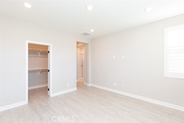 Primary bedroom, view from corner of room.