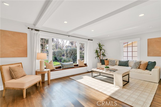 Spacious living room with hardwood floors