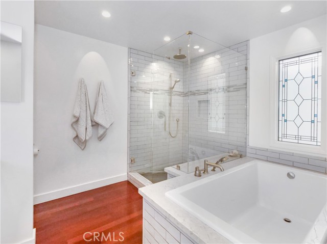 Master Bathroom with Walk-in Shower and Separate Tub