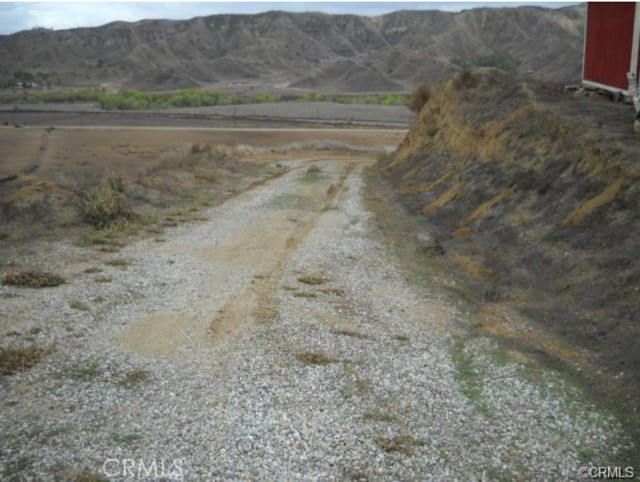 Driveway leading up to a graded area