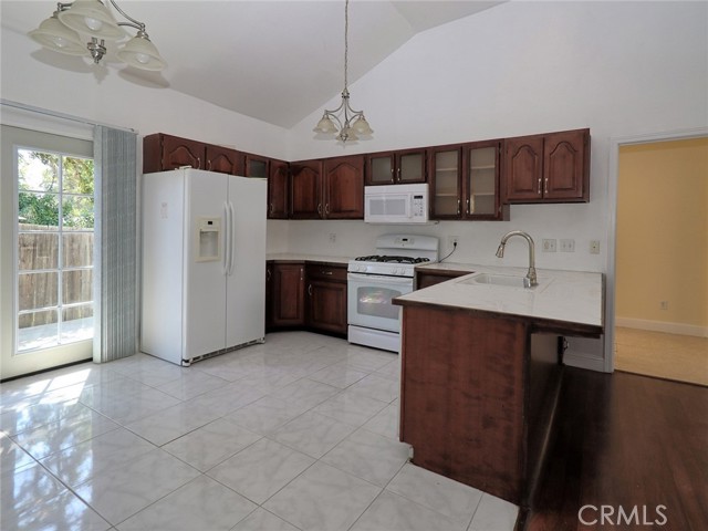 Kitchen, French Doors to side yard.