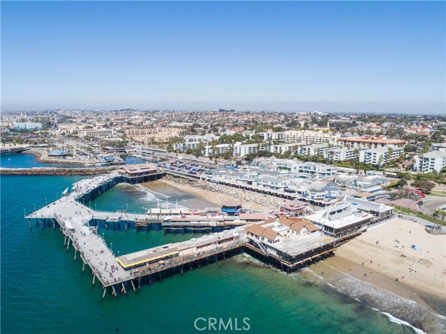 240 The Village 311 Redondo Beach, California PRIVATE CORNER END PENTHOUSE UNIT. PANORAMIC OCEAN VIEWS NESTLED IN THE LUSHLY LANDSCAPED GROUNDS. Resort-like atmosphere. Beautifully appointed interior expands to a spacious deck overlooking the Ocean. Meticulous attention to detail & pride of ownership throughout with views from every room. Upstairs loft/bedroom & bath have breathtaking Ocean, Harbor, & Sunset Views. Walk to shopping, fine restaurants or take a bike cruise along the beach on the world famous strand. HOA amenities include: heated pool, spa & dry sauna all overlooking the Ocean. Unit Features include: Top floor, rare open floor plan~High Vaulted Ceilings~Dual Pane tinted windows~French doors to the downstairs Bedroom w/direct balcony access~Wood burning fireplace~tiled flooring in kitchen, bathrooms & entry. Remodeled kitchen w/Breakfast Bar open to liv room & formal dining. Floor plan is laid out w/a bedrm & bathrm on each floor & addtnl dining room or den on lower level. Living area & down stairs bedroom have direct access to a spacious deck w/incredible views. Walk-in closets on both floors, addtnl storage space. 2 car side by side pkng #22 #23 in Subterranean Garage. Storage cabinets located in front of parking space. Recently painted interior & designer carpeting. Laundry room located near elevator. Amenities Included: Refrigerator, cooktop, stove, microwave, garbage disposal. Utilities include water, trash, sewer. Fully Furnished @ $4300/mo w/electric paid. No electric car charging station in garage.
