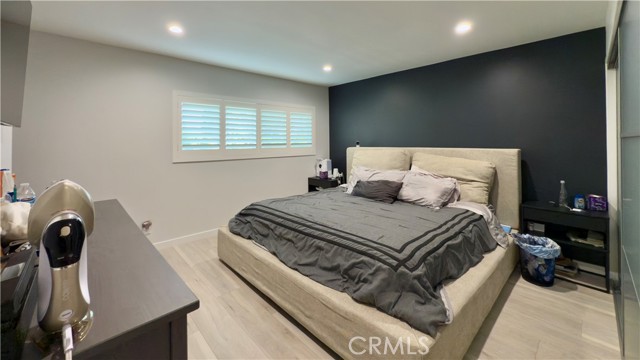 Accent wall and shutters on all windows