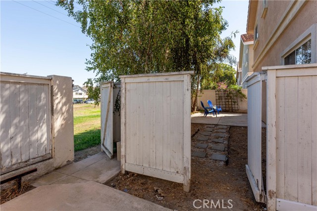 Rear yard has gated access to field behind, perfect for pets or playtime!