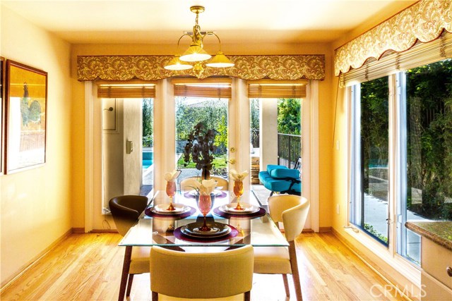 Breakfast nook in kitchen with doors to outside and bar be que