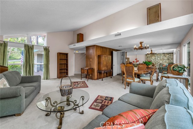 Living dining area allows for massive size furniture.