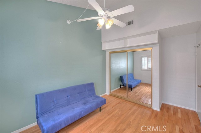 Opposite View Of Bedroom #2.  Mirrored Sliding Doors To Large Closet.  Overhead Ceiling Fan For Cooling Breeze.  Cathedral Ceiling For Open Feeling!