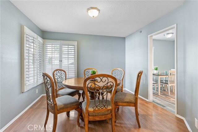 Inviting Formal Dining Room with Plantation Shutters