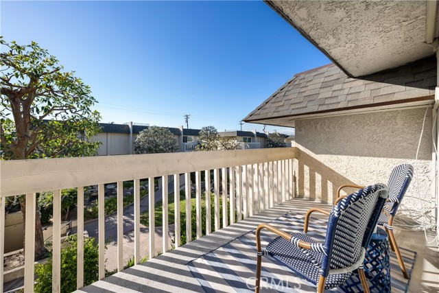 Second bedroom balcony #3 overlooking tranquil gardens and water features.