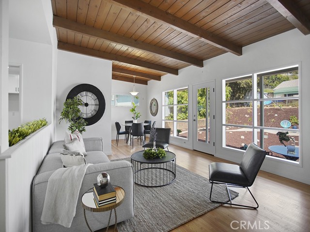 Large Open Floor Plan with Wood Beamed Ceiling