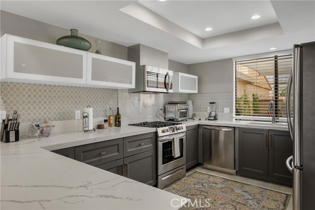Contemporary remodeled kitchen with Stainless Steel appliances.