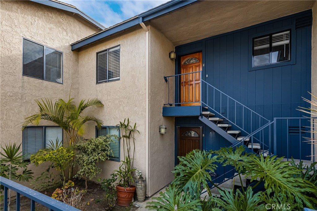 **Discover Coastal Living at Sea View Condos in Dana Point!**  
Experience the ultimate coastal lifestyle in this charming and sunlit 1-bedroom, 1-bathroom upstairs condo in the highly sought-after Sea View Condos community in Dana Point. This inviting home offers an open-concept living space with large windows that frame serene views of lush greenery, creating a peaceful and private retreat.  

Step outside to your private balcony and take in the refreshing ocean breeze and delightful **peekaboo ocean views**—the perfect backdrop for sipping your morning coffee or enjoying vibrant sunsets.  

The cozy kitchen combines functionality with rustic charm, featuring beige lower cabinets, a tall pantry, and textured countertops complemented by a pebble mosaic backsplash. Stainless steel and black appliances, including a Whirlpool microwave, electric range, and dishwasher, complete the space. A dual-basin sink under a sunlit window and vintage-inspired upper cabinets with textured glass fronts framed in green add character, while light wood laminate flooring brings warmth to the space.  

This meticulously maintained condo is part of the tranquil Sea View Condos community, which boasts low HOA fees and fantastic amenities, including a pool, spa, and a detached 1-car garage for added convenience.  

**Location is everything!** You’re just a quick walk to Doheny Beach, Dana Point Harbor, and the vibrant Lantern District. Stroll to sandy shores in minutes and explore scenic coastal trails, watersports, and outdoor adventures. Whether biking, fishing, golfing, hiking, or simply relaxing by the ocean, this is the ultimate spot for an active beachside lifestyle.  

Don’t miss this rare opportunity to own a beautifully maintained home in the heart of Dana Point. Perfectly priced and move-in ready, it’s your gateway to quintessential Southern California beach living. (please note: many homeowners have the made the space that we show as a dining area into a 2nd bedroom)