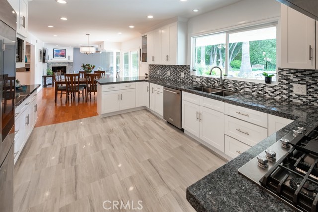 Bright kitchen with gorgeous backyard view