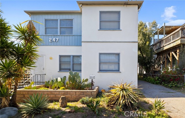 247 Bicknell Avenue Santa Monica, California Steps to the Beach from this classic 4 unit building (Circa 1950's) with garages. Two units on the ground floor and two unit above - which comprise an OWNERS UNIT. All units 2 bedrooms are light and bright and the floorplans are spacious with large kitchens and kitchen to living room pass throughs. Owner has done much remodeling with new copper plumbing, kitchen and bath remodeling, new roof yet has maintained the original character with hardwood floors throughout. Walk to the Metro and 3rd Street Promenade.
