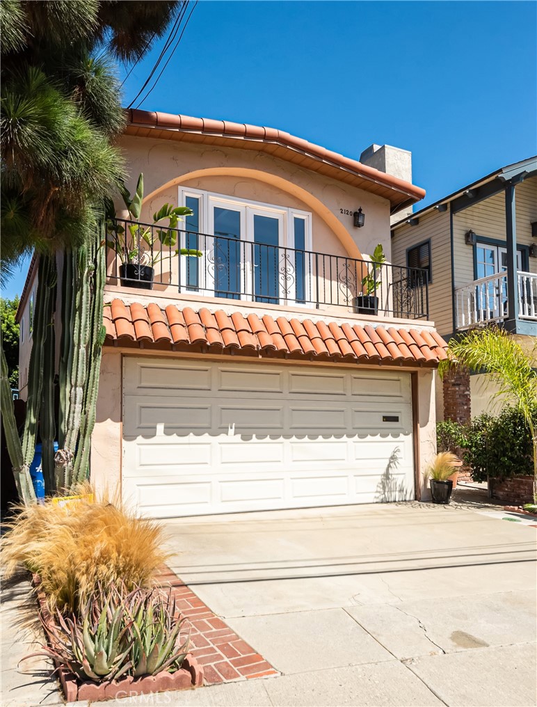 Hermosa Beach home with a tastefully updated interior and a beautifully landscaped yard. The top floor’s functional and open layout provides an easy flow from the enhanced kitchen, to the dining area, and onto the living room where double doors open to the balcony providing amazing ocean breezes throughout the entire home. The primary suite features a walk-in closet and personal bath. Two guest bedrooms, or use one as a designated office space, along with a full-sized guest bath, and direct access from the two-car garage can be found on the lower level. The enclosed back yard offers room to play in the grassy yard or BBQ on the large patio surrounded by fruit trees for added privacy. Thoughtfully updated with new flooring and trim, fresh interior paint, new refrigerator, dishwasher and hardware in the kitchen, along with upgraded lighting. Centrally located in-between downtown Hermosa and Manhattan Beach - near every city convenience from stores to nightlife, as well as easy access to the beach – this home may just give you what you’ve been searching for.
