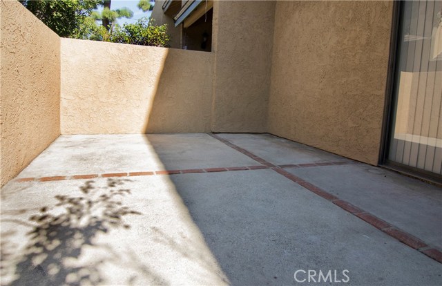 Large private front patio.  Lots of space for tables, chairs and BBQ.