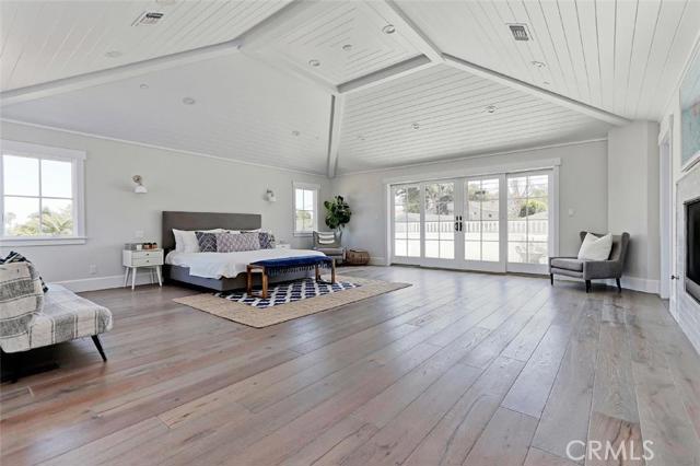 Huge master bedroom with vaulted tongue-and-groove ceiling