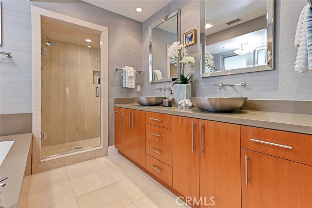 Master Bathroom with Dual Vessel Sink Countertop and Separate Shower