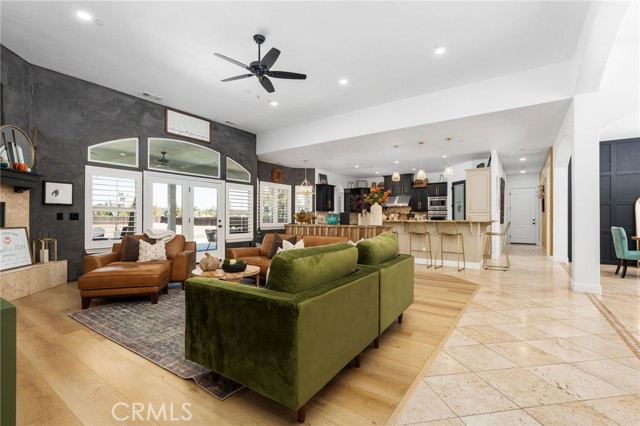 Living room with 12' ceilings and access to backyard