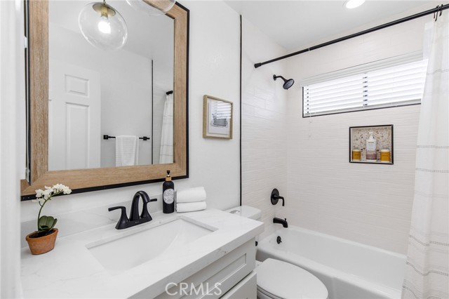 Guest bathroom on top floor next to bedrooms.