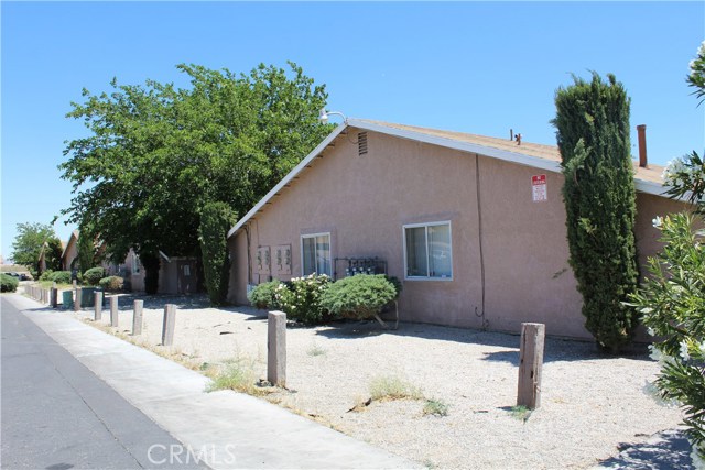 11211 La Habra Avenue Adelanto, California Please contact Le Investment Group for full offering memorandum. Drive by only please do not disturb the tenants. Thank you.
Attractive Current CAP Rate of 7.03% With ProForma CAP Rate of 7.48%. Current GRM of 8.30, ProForma GRM of 7.93. Property is Located in the Opportunity Zone. This provides eligible investors with favorable long term tax benefits. Single Story, Covered Parking, Central A/C, Onsite Laundry Available, Private Patio for the Tenants. 30 Units Renovated to include paint, flooring, A/C, and water heaters. The Desert Oasis Apartments are located on the corner lot of La Habra Avenue and Bellflower Street. This single story apartment building is placed on a 2.03-acre lot and is composed of (24) 1 Bedroom, 1 Bath units and (24) 2 Bedroom, 1 Bath Units. The tenants are provided with secure onsite covered parking as well as access to the laundry facilities. The owner has renovated 30 of the 48 units to include new flooring, paint, water heaters and A/C units. This apartment community has been well maintained throughout ownership. The current owner does updates and improvements on a scheduled basis. The repairs and maintenance of the property and ground have been done as necessary, on time, & without deferring maintenance. The condition of the property offers prospective buyers an asset that will require very minimal maintenance for decades to come.