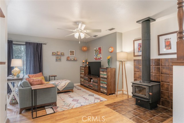 Cozy living room with freestanding woodstove for those chilly winter evenings.