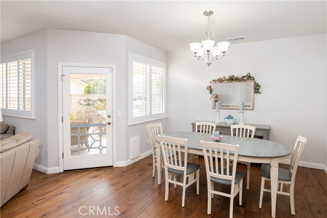 Dining room next to the kitchen and the master bedroom on the other side of the house.