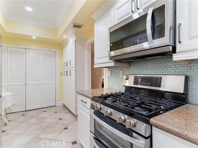 Laundry and eat-in area in kitchen.