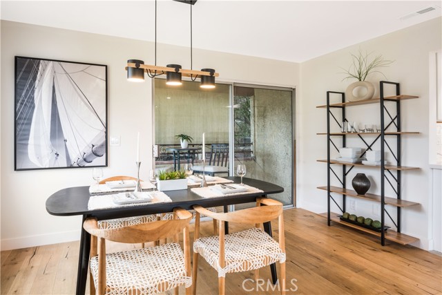 Dining area with new designer lighting.