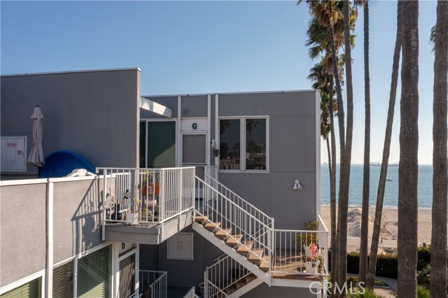 Rear entrance with access via stairwell