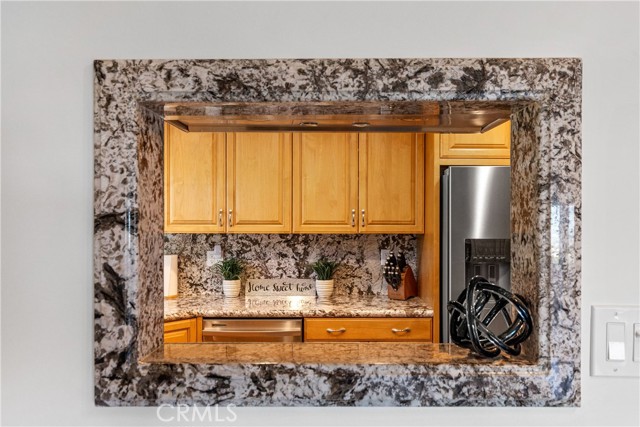 The kitchen is open to the living area and view.