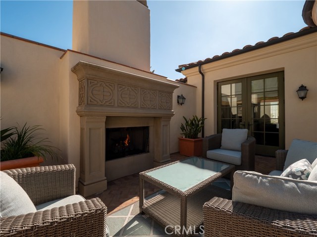 French doors lead from the courtyard to the gourmet kitchen.