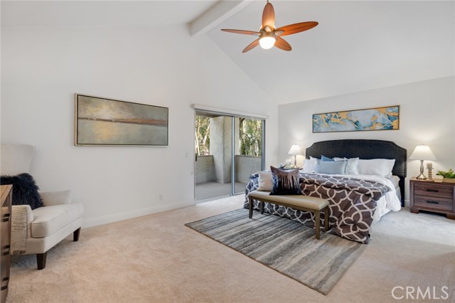 Master Suite with Tree/Woods views off balcony.