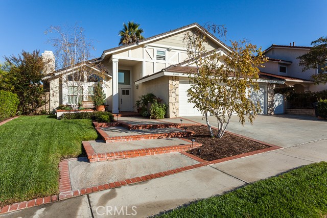 23982 Ironhead Lane Laguna Niguel, California IMAGINE LIVING AMONGST THE ROLLING HILLS OF LAGUNA NIGUEL... There aren't many places that give you the feeling of open spaces, scenic hills, and beautiful mountain views. However, this KITE HILL listing offers that and more. The home provides a bright and sunny living room area that is adjacent to a formal dining room. The kitchen is upgraded with granite counters, shaker styled cabinetry, recessed lighting, and space for family dining. All this opens to the inviting family room that is wrapped around a gas log fireplace. The most popular feature of this floor plan is the large downstairs bedroom and full bath. Upstairs will appeal to the masses with the additional bedrooms that are all oversized by today's standards. Dual paned windows, designer upgrades, hardwood flooring, and an entertainer's backyard with fire pit and BBQ will entice the picky home buyer. The benefits of Kite Hill are the association pool and spa (only minutes away), six tennis courts, full size basketball court, sand volleyball area, children's play area, a sports field and a club house.