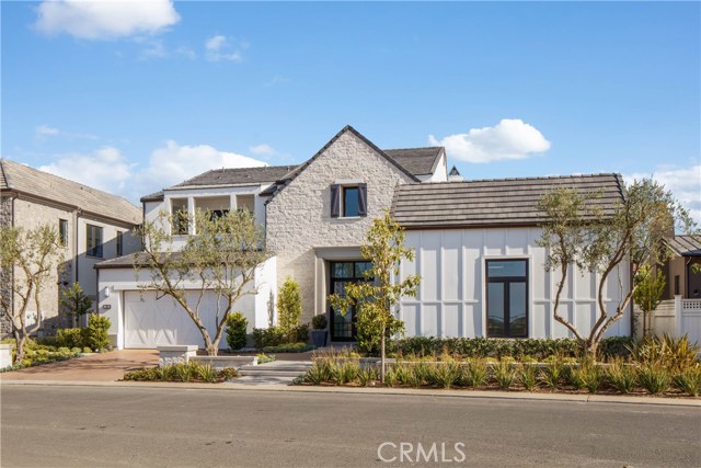 30 Philips Ranch Road Rolling Hills Estates, California NEW! Sensational Modern Farmhouse view home located in the prestigious gated Rolling Hills Country Club community. This newly completed Sunningdale plan brings together distinctive modern elements and urban style in an open plan living. Enter through double glass doors and be greeted with soaring 22-foot high foyer and great room featuring a wall of glass and stacking glass doors showcasing the view. Designed for easy entertaining and indoor-outdoor living, first-floor features include a master suite with a sitting area where stacking glass doors accent the golf course view, a generous walk-in closet, and sumptuous master bath with large soaking tub and walk-in shower. A chef’s kitchen with Wolf appliances, two additional bedroom suites, an office, convenient powder room, and laundry complete the main floor. Secluded on the second floor are a sizable bonus room with a large covered deck to enjoy the scenic golf course views and fourth bedroom with walk-in closet, full bath, and covered balcony. ADDITIONAL HIGHLIGHTS include wood flooring and contemporary glass stair rails and landscaping. The award-winning Palos Verdes School District is one of the top-ranking school districts in California. Located within a short distance to LAX and all the LA metro area. Local attractions include miles of trails, nearby beaches, resorts, fine dining and shopping.