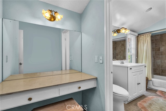 Dressing table between upstairs master bedroom and bathroom.